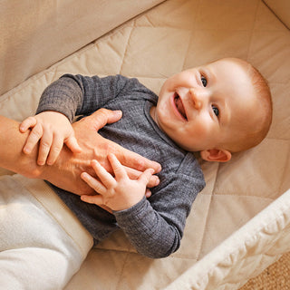 When do babies smile?